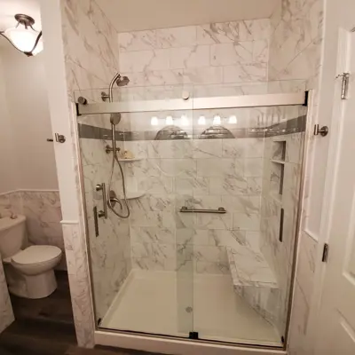 Beautiful Shower w/ Schluter bench Photo